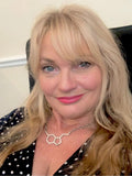 Linda K.